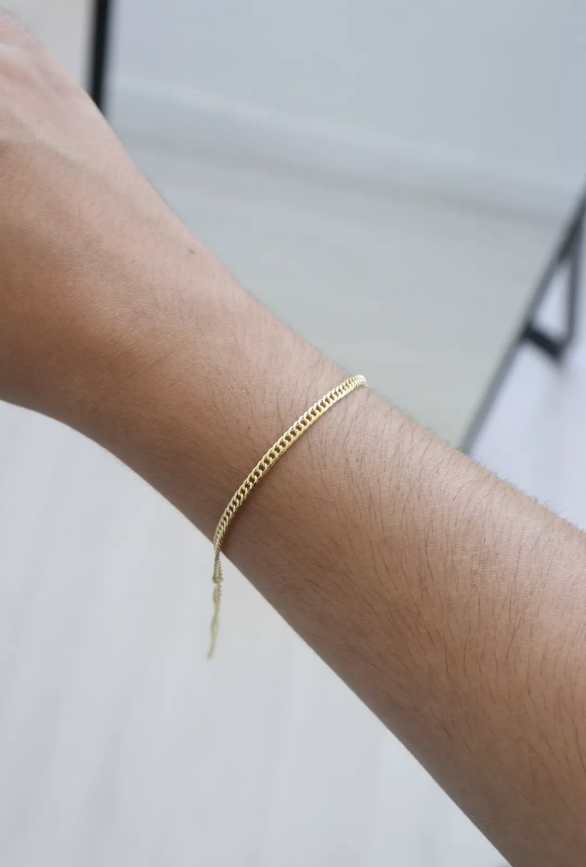 Pulseira Grumet Dourado — foto no corpo